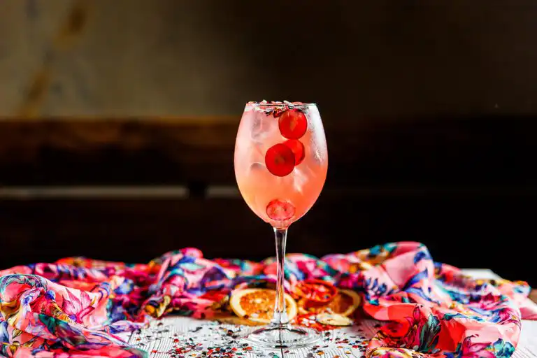 Pink cocktail with berries