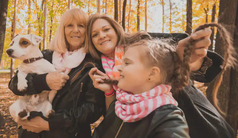 Family with dog in autumn